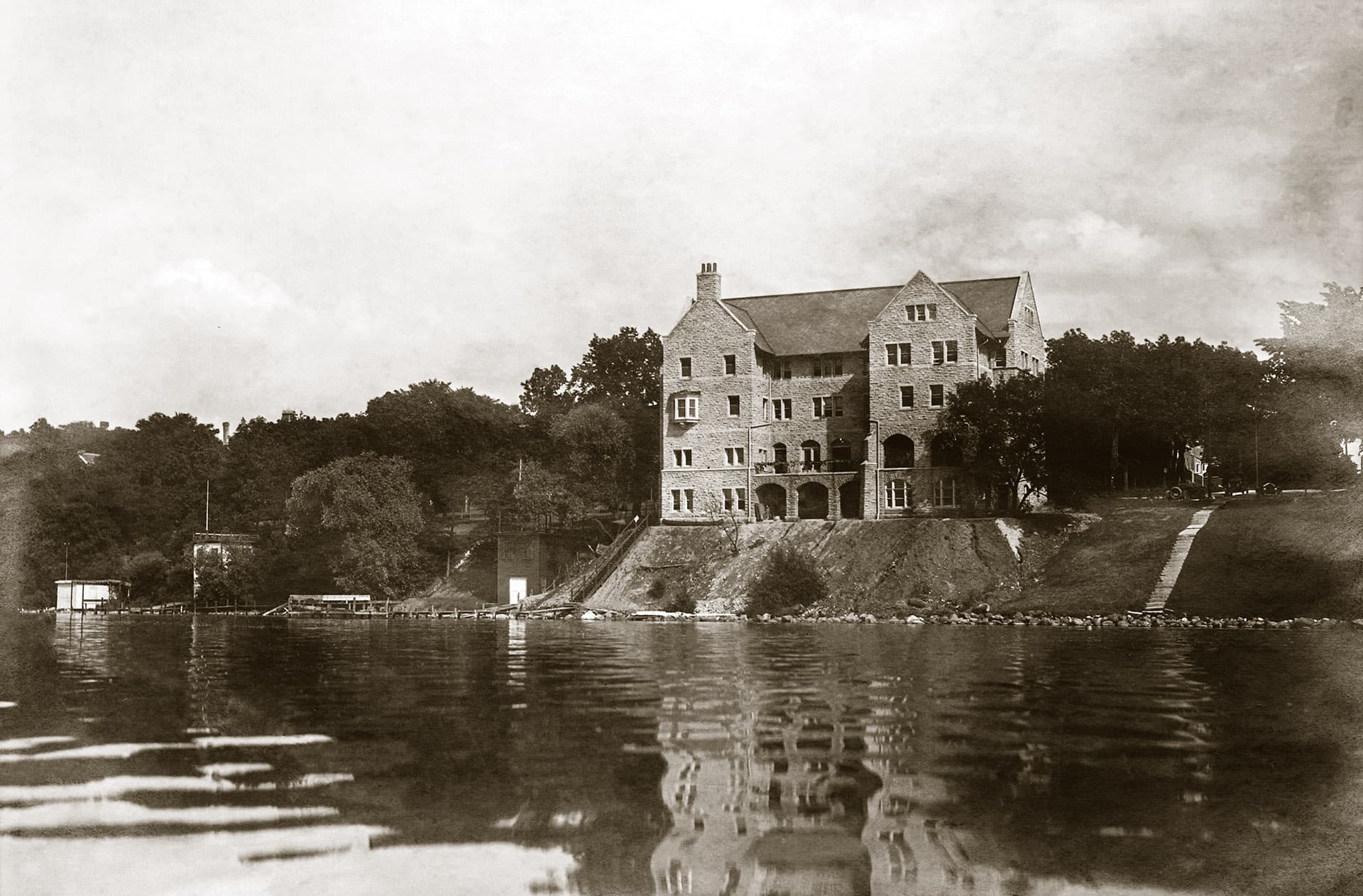 View of the Alpha Iota Lodge from Lake Mendota. Our Lodge was entered into the National Register of Historic Places in 1988.